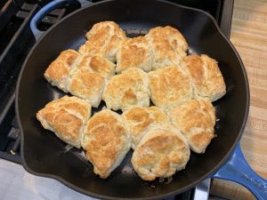 Buttermilk biscuits baked in cast-iron frying pan.